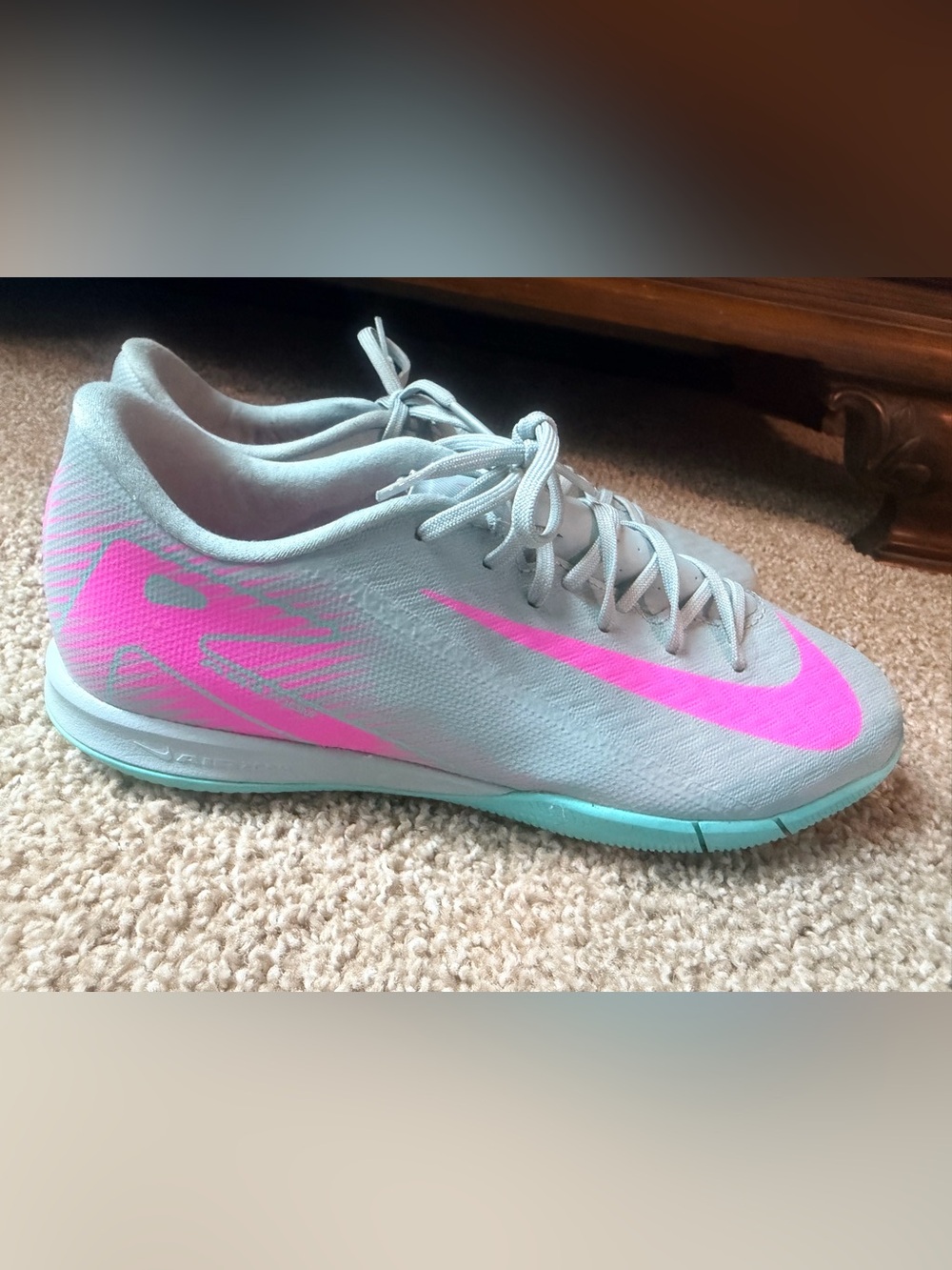 Nike Women’s Light Gray Athletic Shoes with Pink Swoosh